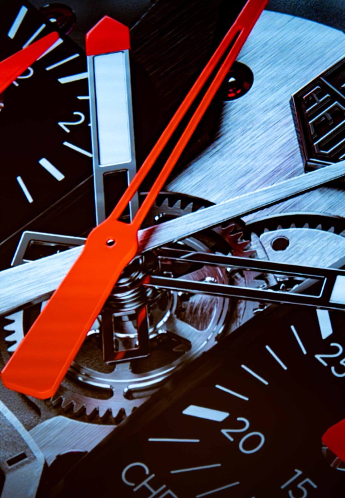 Close-up view of a luxury chronograph watch dial with red hands and exposed mechanical details during Watches & Wonders – Geneva International Watchmaking Exhibition.